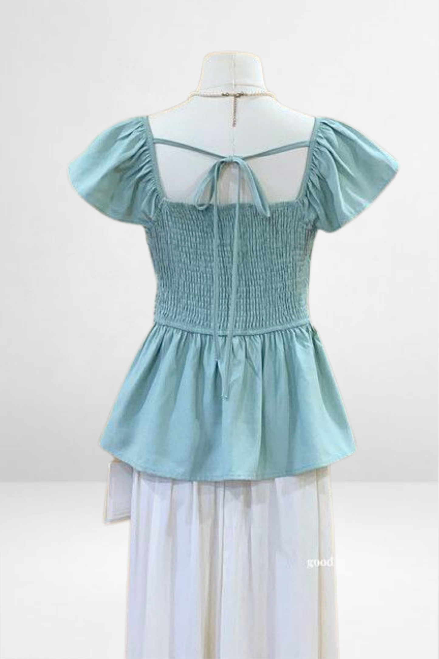 Smocked Peplum Top